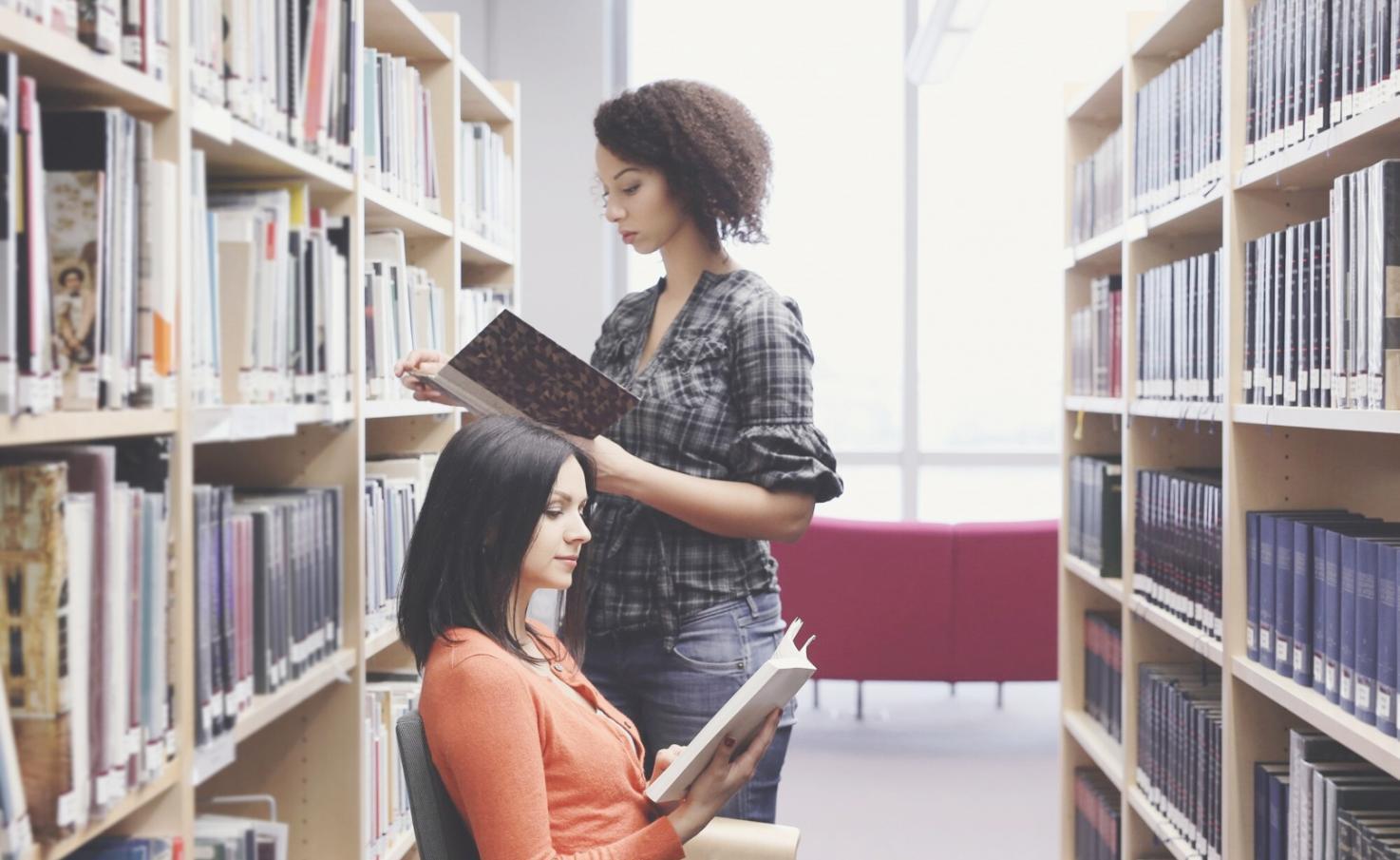 Team meeting discussing client feedback and software improvements